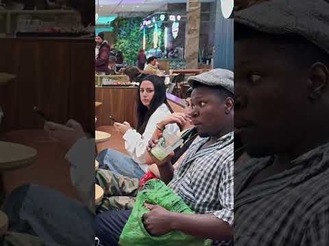 Napi taking stranger’s drink in Spain